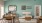a room with a table chairs and a tv