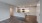 a kitchen with white cabinets