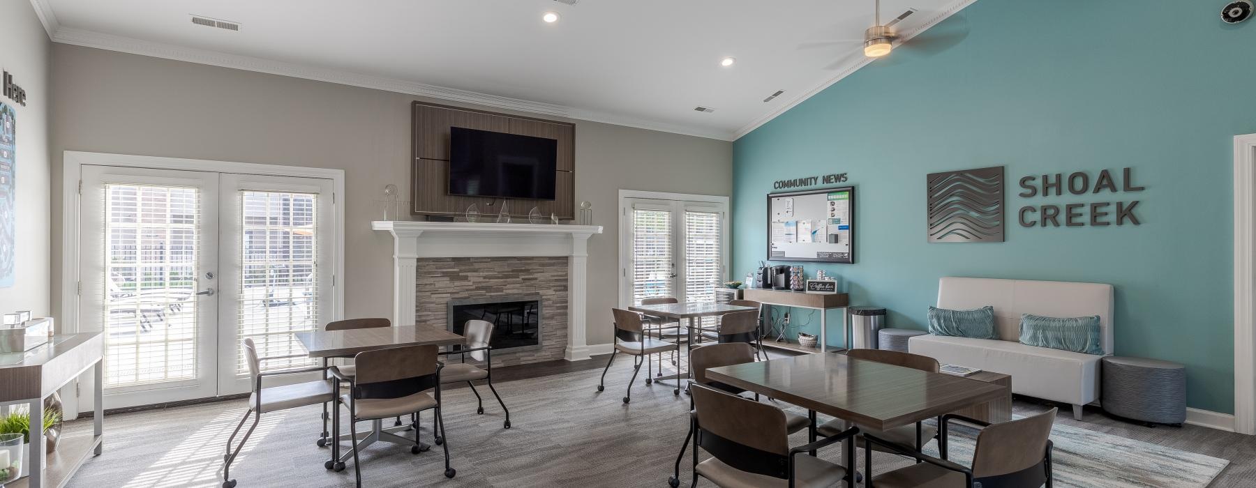 a room with a table and chairs