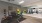 a room with exercise equipment and a large mirror